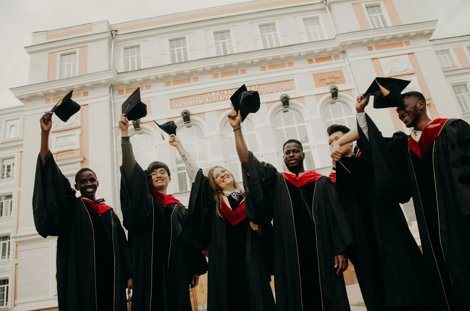 group of people wearing black academic dress